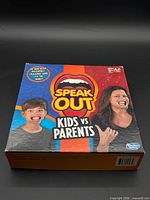 Front of Hasbro Speak Out Kids vs Parents board game box