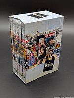 Front angled view of boxed 5-DVD set displaying collage artwork