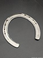 Front view of steel horseshoe