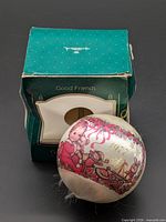 Ornament next to original Hallmark box