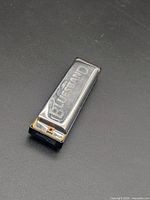 Top view showing BluesBand Hohner International logo on chrome cover