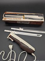 Handle, two blades, original box overview