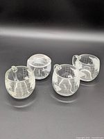 Set of three globe mugs and sugar bowl with lid
