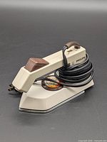 Left side view of Philips iron with cord wrapped