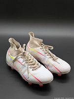 Pair of Puma Future Z cleats side view