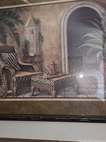 Overall view of one framed print showing image details and frame style