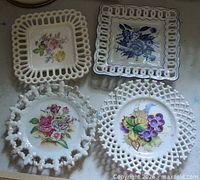Group shot of all four lace-edged plates