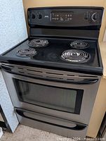 Full view of Kenmore electric stove front and top