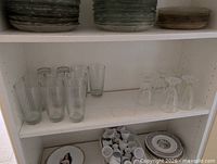 Shelf view showing tumblers and carafes