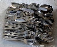Overhead view of entire pile of flatware