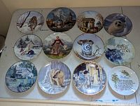 All 11 decorative plates arranged together