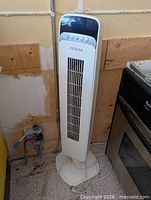 Full view of Noma tower fan showing height and base
