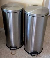 Front view of both stainless steel cans