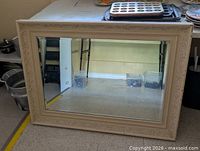 Front view of mirror showing full frame and glass
