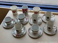 Group shot of all cups, saucers and mugs