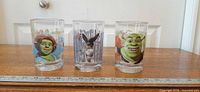 Front view of three character glasses