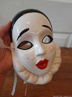 Front view of ceramic Pierrot clown mask