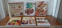 Front view of all six Weight Watchers cookbooks