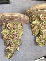 Pair of ornate resin corbels front view