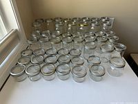 Full group of jars arranged on table showing quantity and sizes