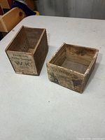 Both wooden boxes side by side on table