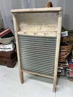 Front view of wooden washboard showing glass panel and frame