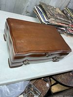closed wooden cutlery chest showing exterior condition and serpentine front