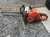 Full view of Husqvarna 357XP chainsaw showing 18-inch bar, body and handles