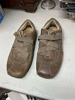 Top view of pair showing overall condition and strap design