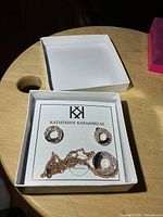 Necklace and earrings set in open Katherine Karambelas box
