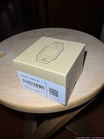 Closed retail box with watch outline