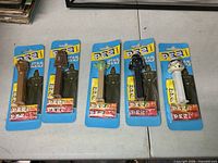 Group view of all five sealed Star Wars PEZ dispensers on cards