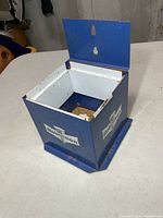 Exterior of blue Robinson cone dispenser