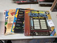 Stack of ten compilation LPs, covers partially visible