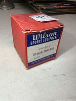 Closed retail box showing Wilson branding and product details