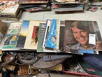 Stack of assorted LPs showing Beatles, Vicky, Fats Domino?, Glen Campbell covers