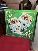 Front cover of Dr Hook “Sometimes You Win” album resting on chair