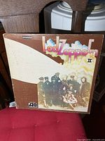 Front cover of Led Zeppelin II LP showing title and group photo