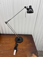 Full view of adjustable desk lamp showing overall design