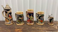 Front view of all five steins