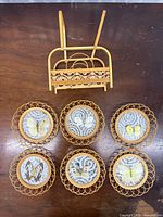 Coasters laid out with holder above showing full lot
