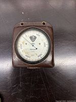 Front view showing dial, markings, and overall wear