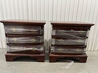 pair of nightstands front view, drawers wrapped
