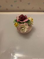 Oblique view of bouquet showing rose colours and base