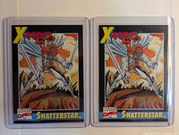 Front view of two Shatterstar #2 cards in sleeves