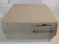 Front/top view of beige Apple Power Macintosh G3 desktop with floppy drive and optical bay