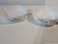 Pair of square CorningWare Cornflower dishes top view