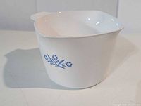 Side view showing Cornflower motif and overall shape with handle