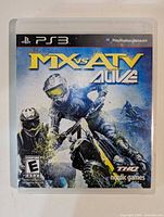 Front of PS3 case showing MX vs ATV Alive cover art
