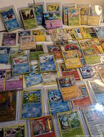 Overview of entire spread of sleeved Pokémon cards